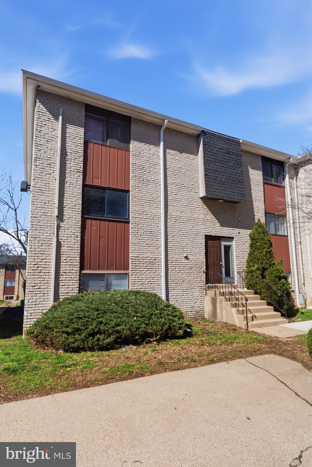 8030 Ditman Street, Unit 40G Philadelphia, PA 19136 - Photo 2 of 16 a front view of a house with a yard and garage