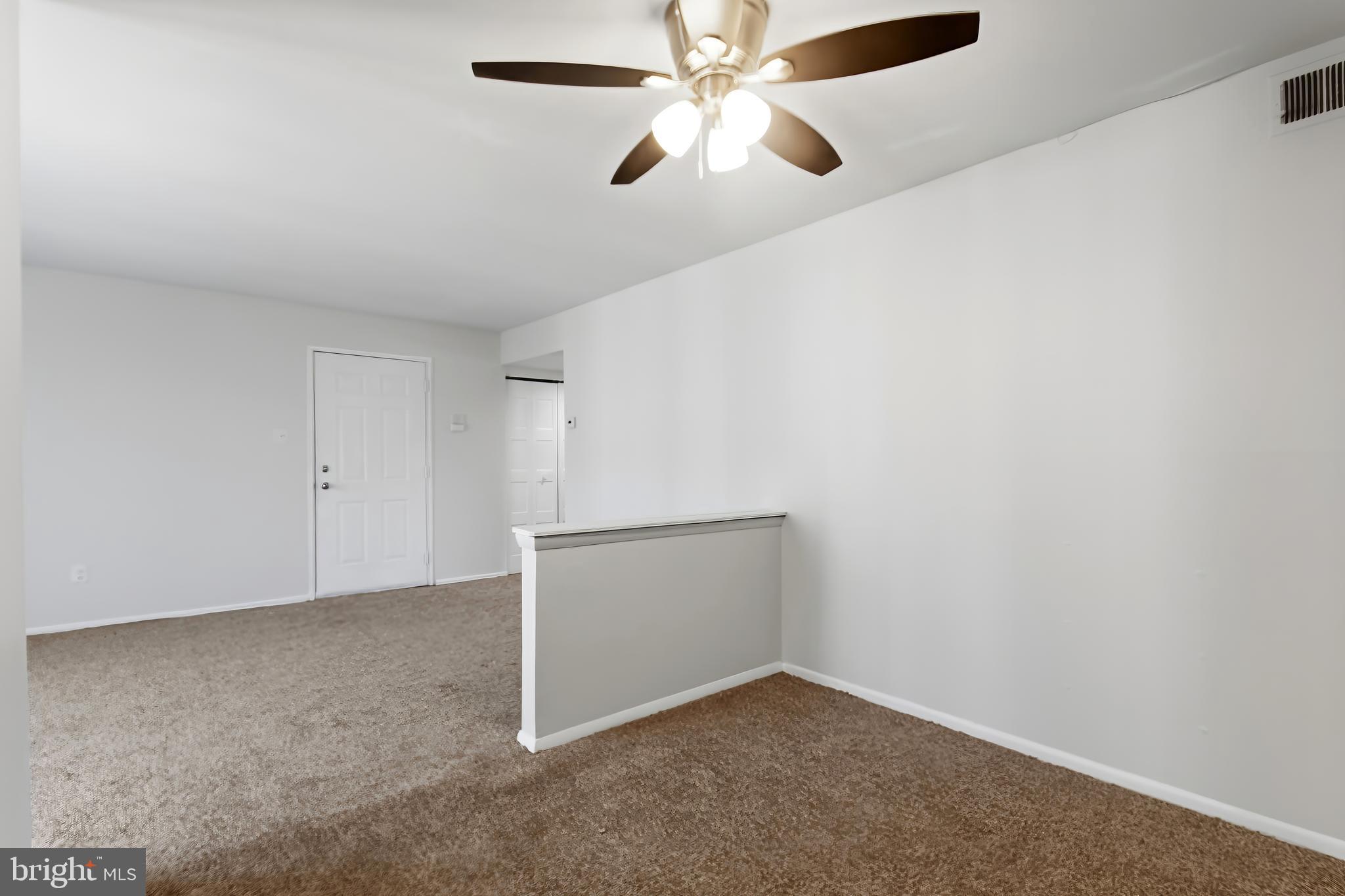 8030 Ditman Street, Unit 40G Philadelphia, PA 19136 - Photo 5 of 16 an empty room with closet and fan