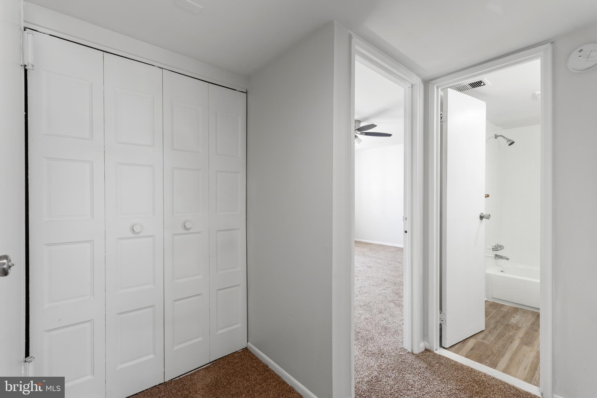 8030 Ditman Street, Unit 40G Philadelphia, PA 19136 - Photo 10 of 16 a bathroom with a shower and a sink