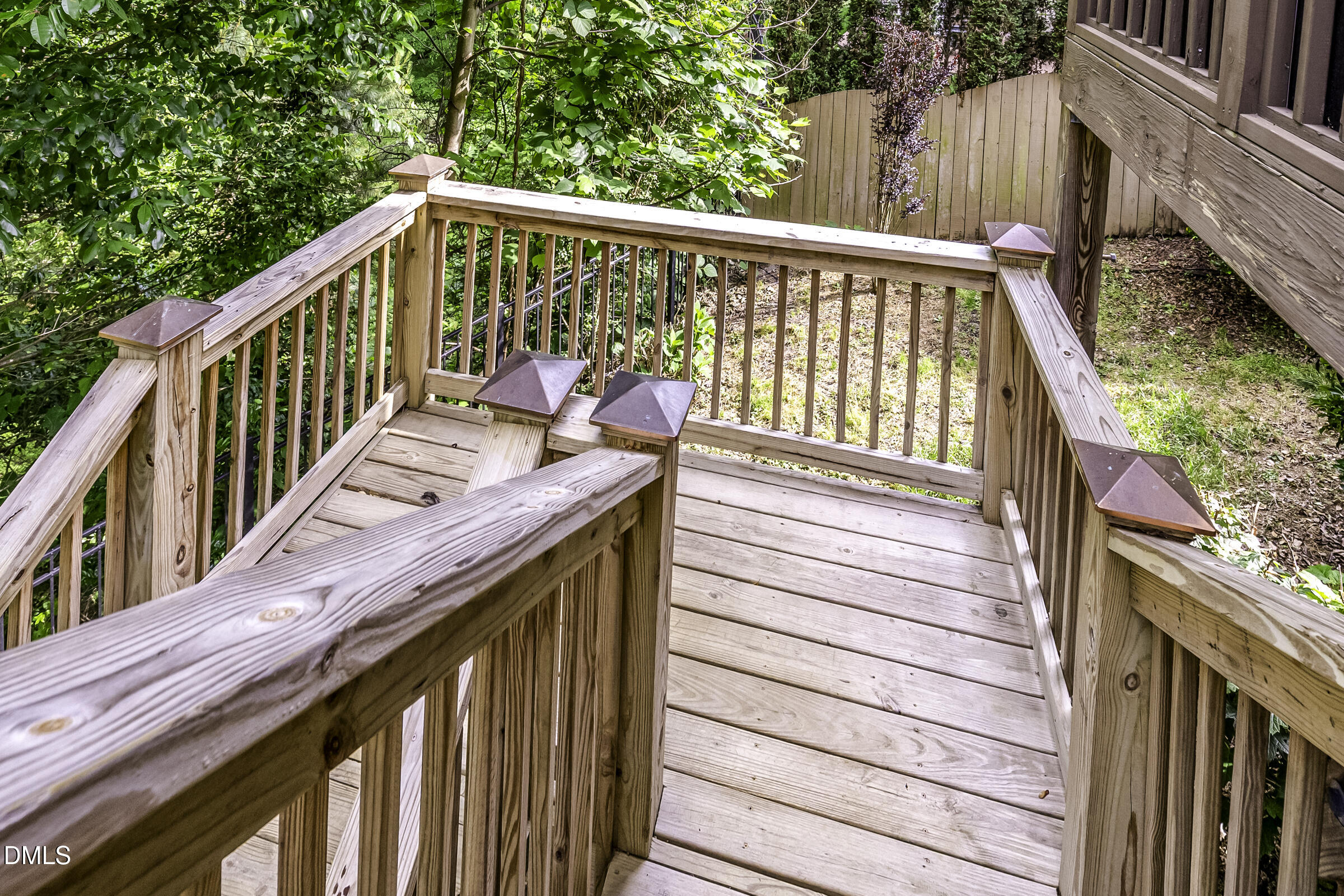 201 Quarryrock Road Holly Springs, NC 27540 - Photo 2 of 34 a view of balcony with wooden floor and fence