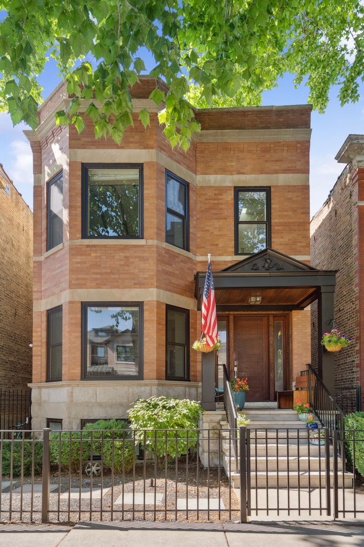 front view of a house with a small yard