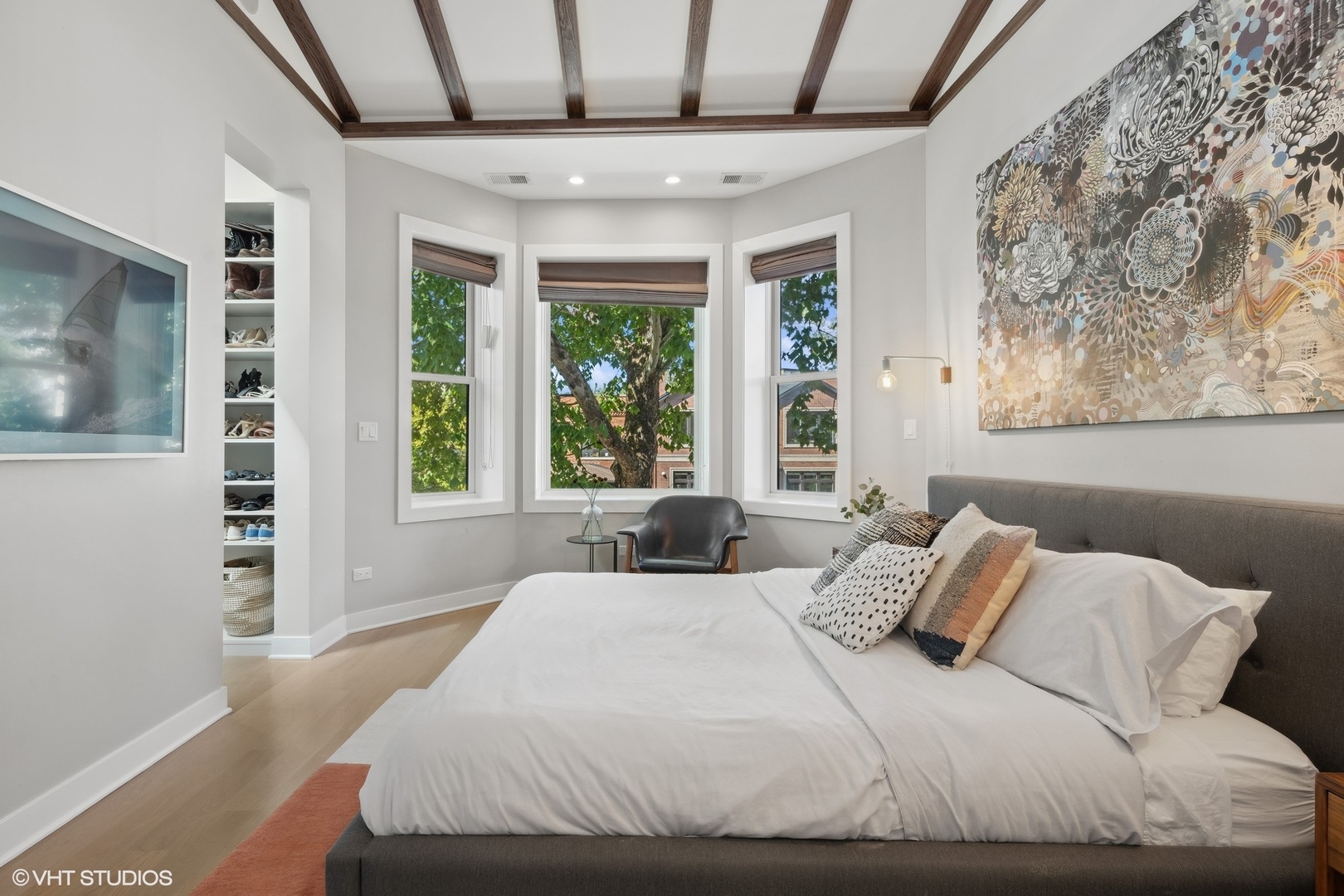 1925 West Grace Street Chicago, IL 60613 - Photo 17 of 45 a bedroom with a large bed and a window