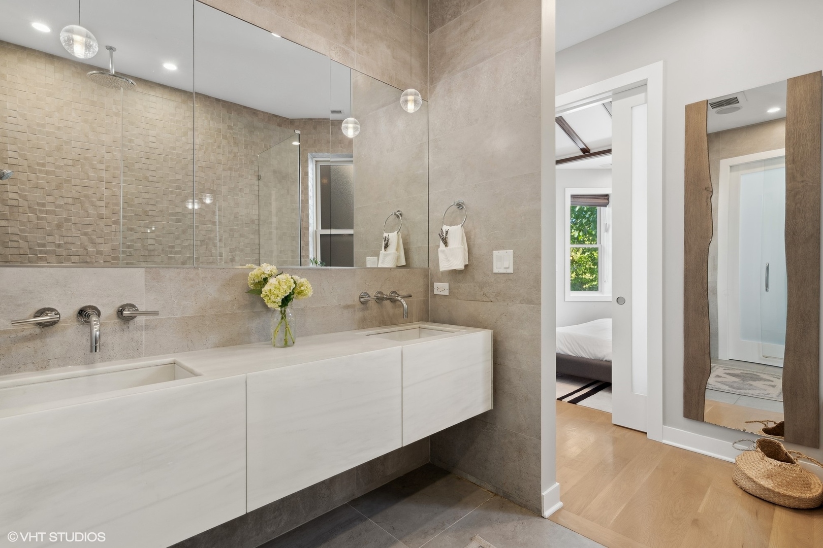 1925 West Grace Street Chicago, IL 60613 - Photo 19 of 45 a bathroom with a sink and a mirror