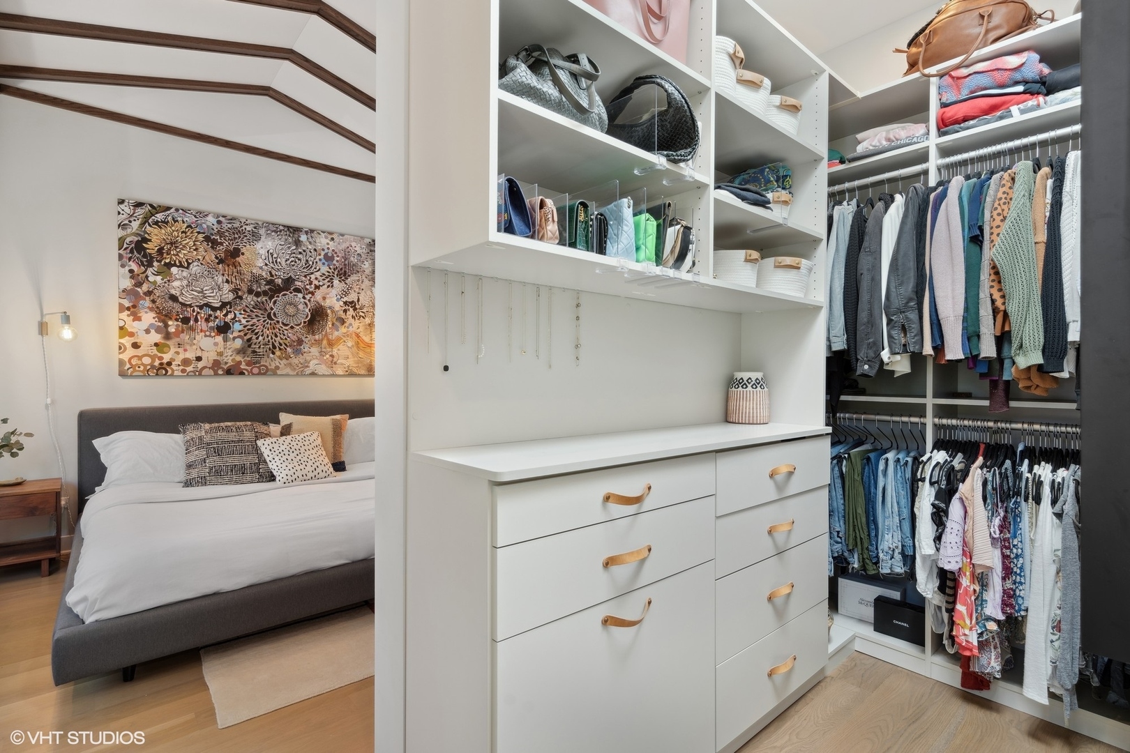 1925 West Grace Street Chicago, IL 60613 - Photo 22 of 45 a view of walk in closet with clothes and shoes