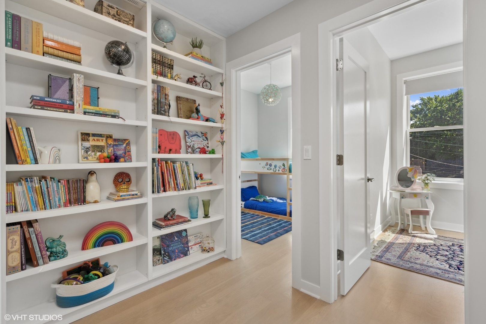 1925 West Grace Street Chicago, IL 60613 - Photo 25 of 45 a bedroom with furniture and a book shelf