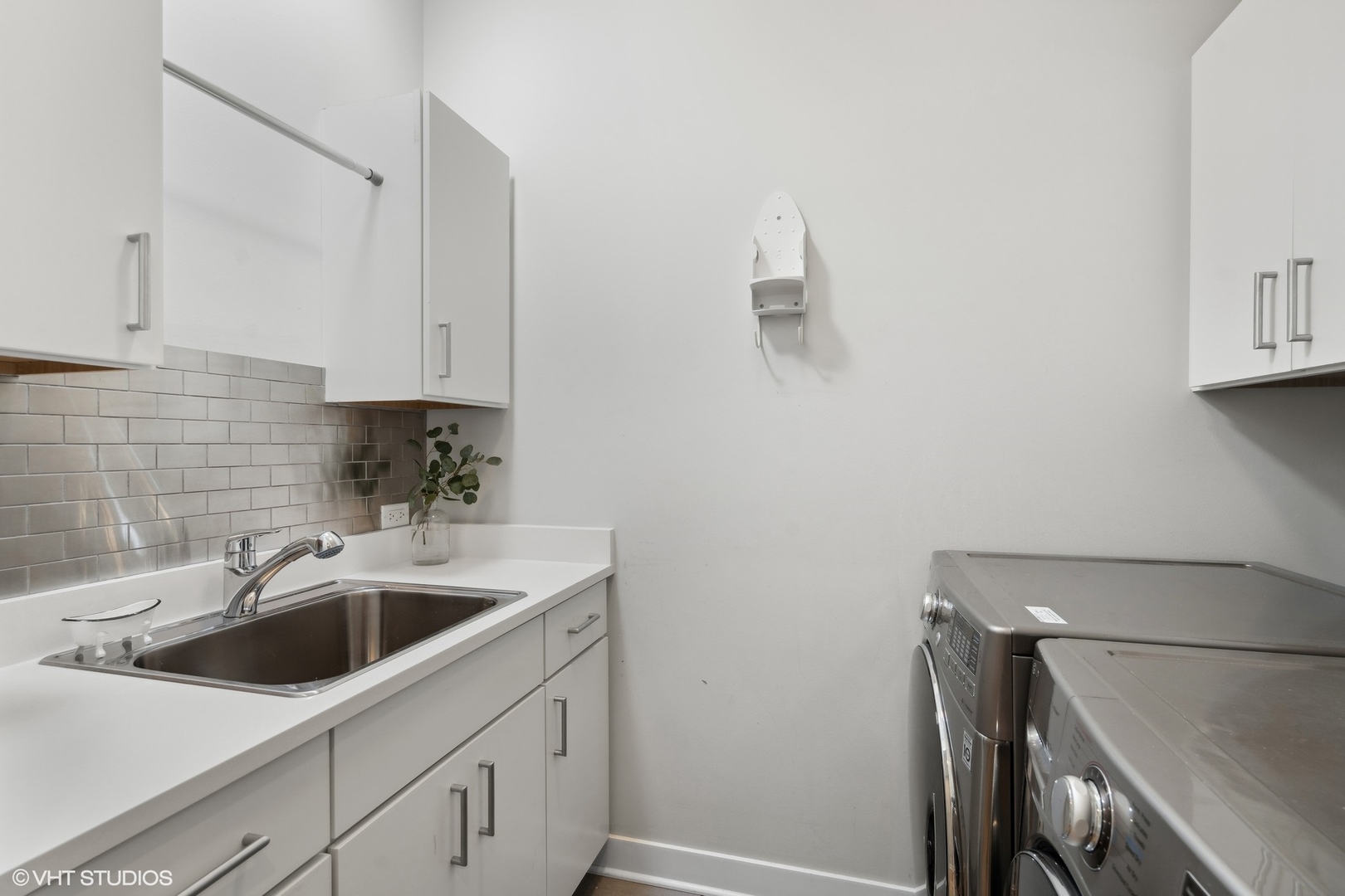 1925 West Grace Street Chicago, IL 60613 - Photo 28 of 45 a kitchen with a sink and cabinets