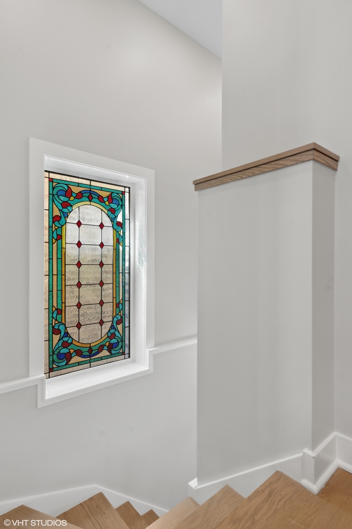 1925 West Grace Street Chicago, IL 60613 - Photo 29 of 45 a view of a hallway with workspace