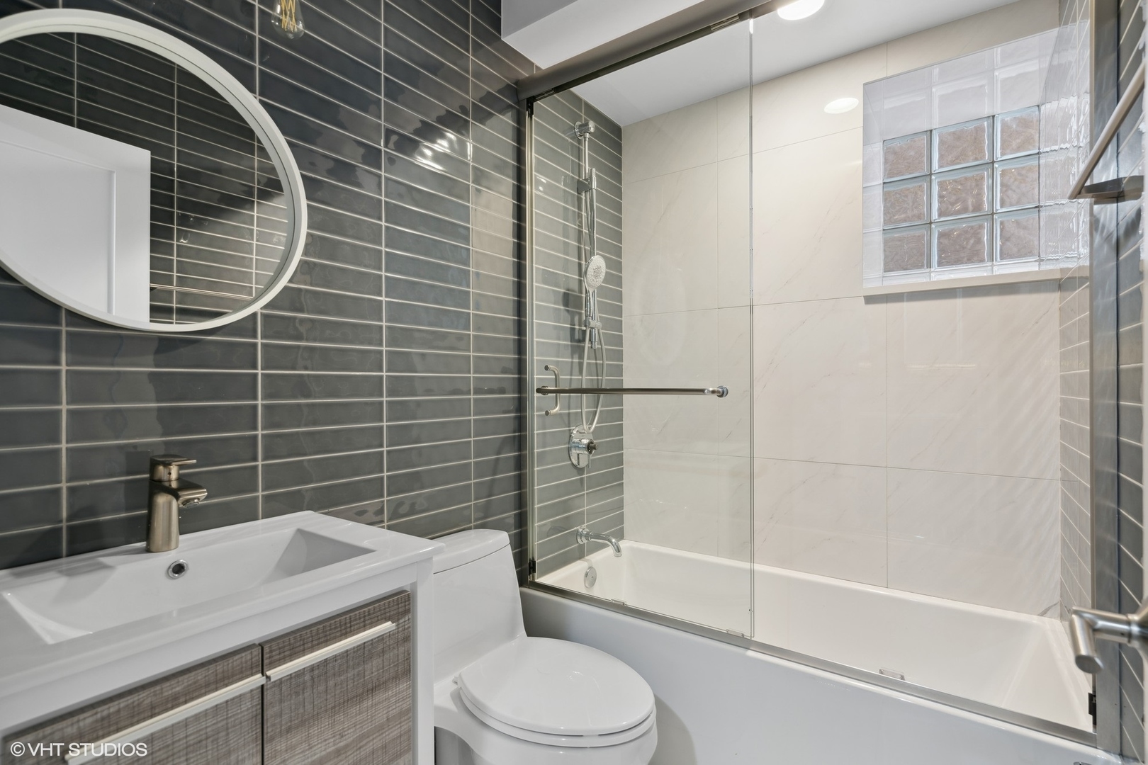 1925 West Grace Street Chicago, IL 60613 - Photo 34 of 45 a bathroom with a sink toilet and shower