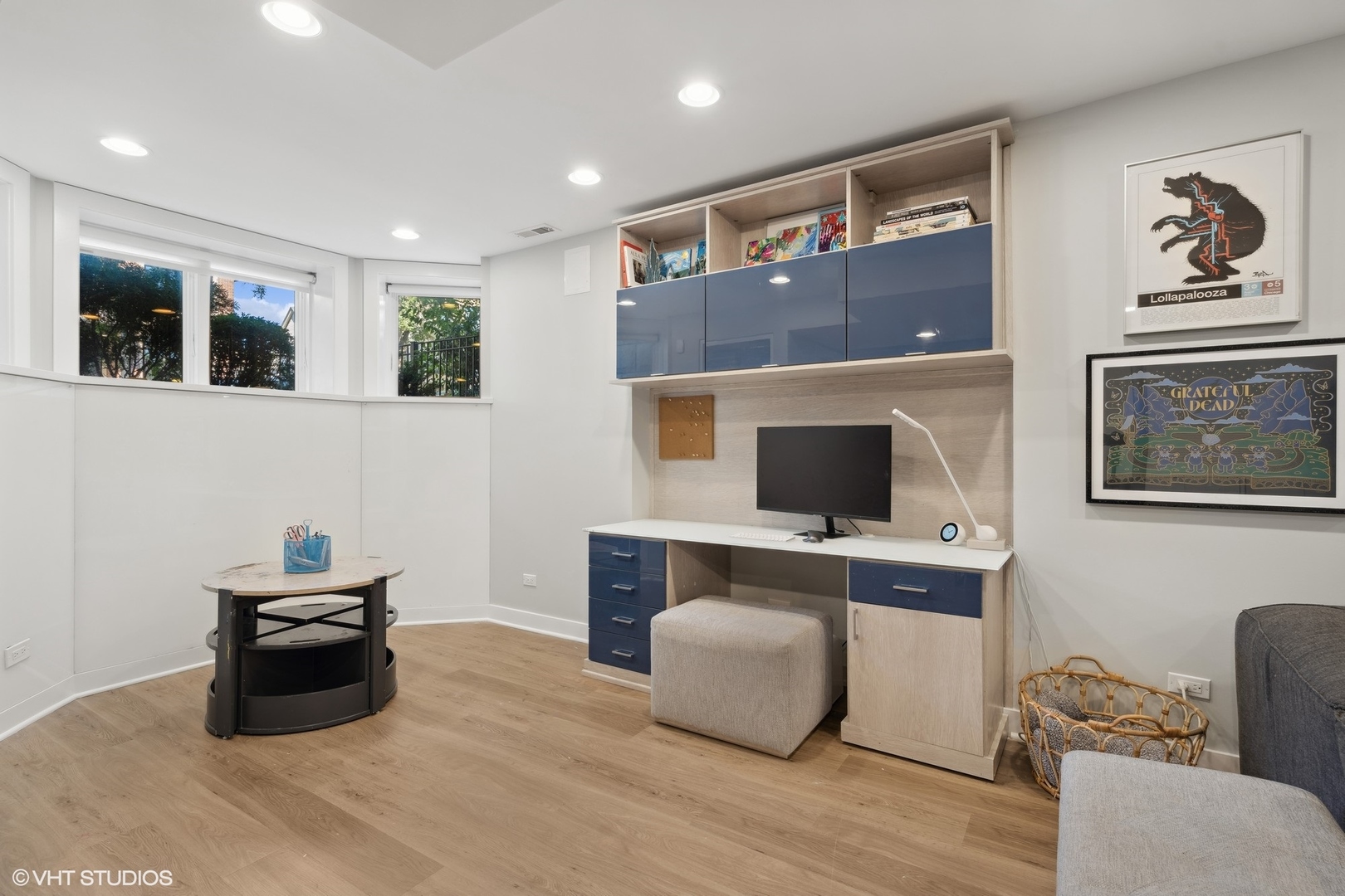 1925 West Grace Street Chicago, IL 60613 - Photo 35 of 45 a living room with furniture and a flat screen tv