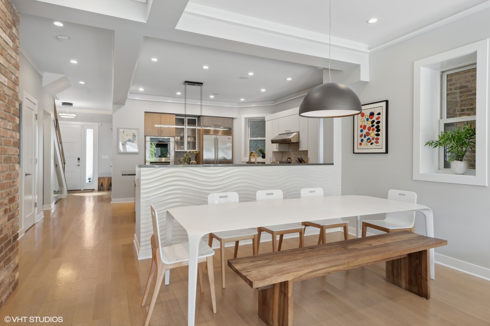 1925 West Grace Street Chicago, IL 60613 - Photo 8 of 45 a view of a dining area with furniture and wooden floor