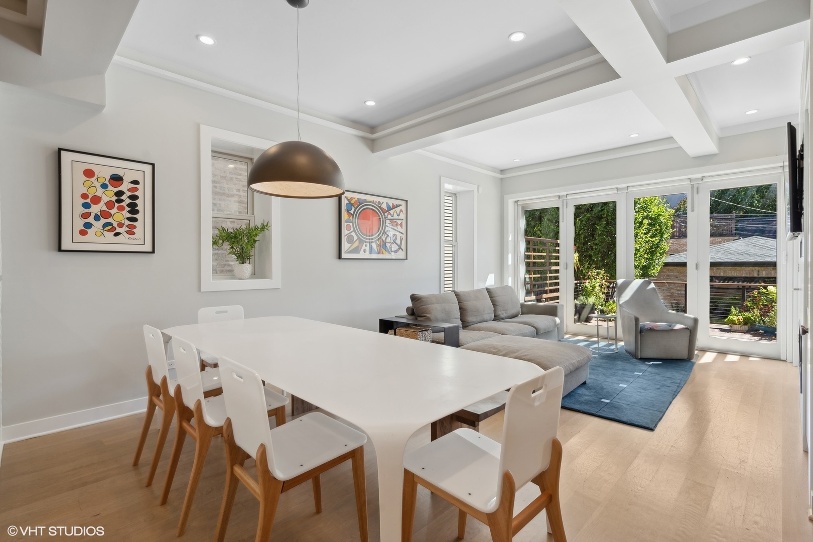 1925 West Grace Street Chicago, IL 60613 - Photo 9 of 45 a view of a dining room with furniture wooden floor and chandelier