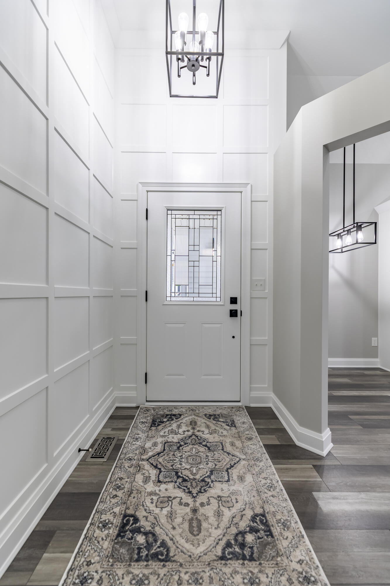 1607 Geranium Circle Valparaiso, IN 46383 - Photo 12 of 30 a view of a hallway with wooden floor