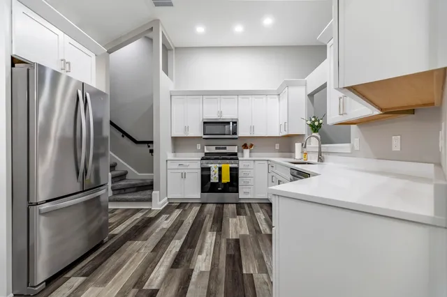 a view of wooden floor in an empty room