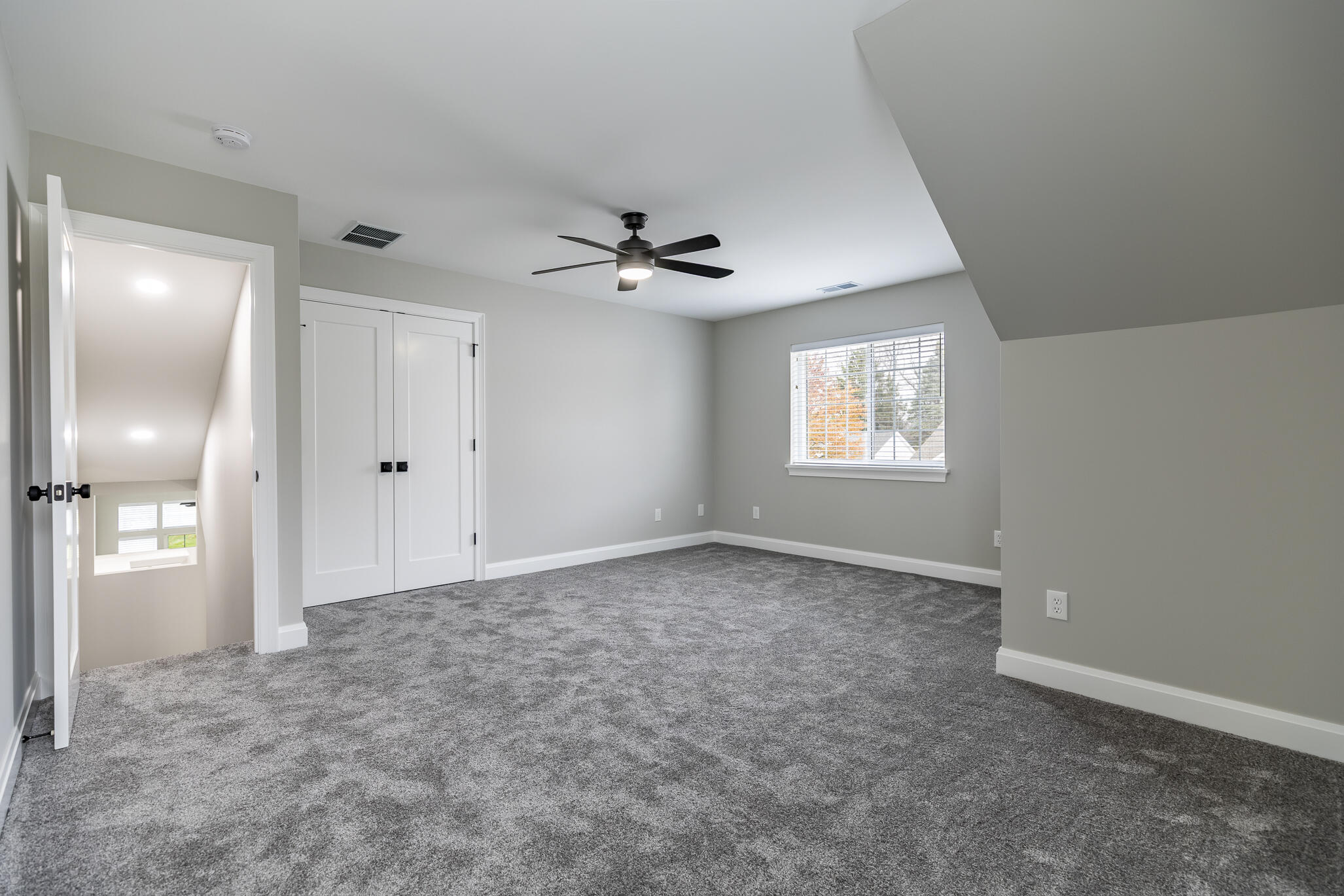 1607 Geranium Circle Valparaiso, IN 46383 - Photo 23 of 30 an empty room with fan and windows