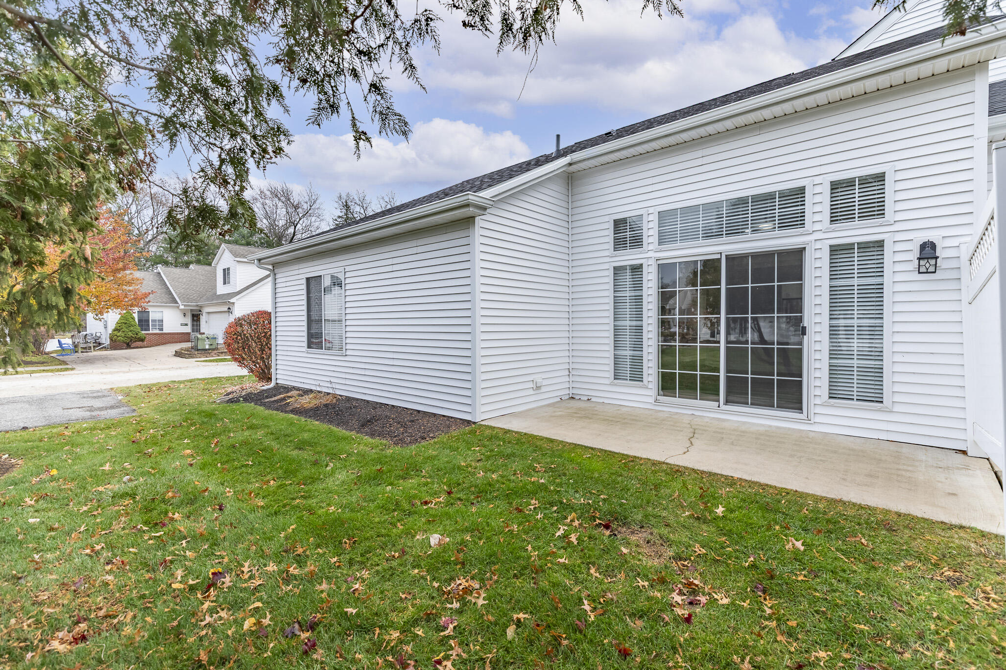 1607 Geranium Circle Valparaiso, IN 46383 - Photo 6 of 30 a view of a backyard with a garden and plants