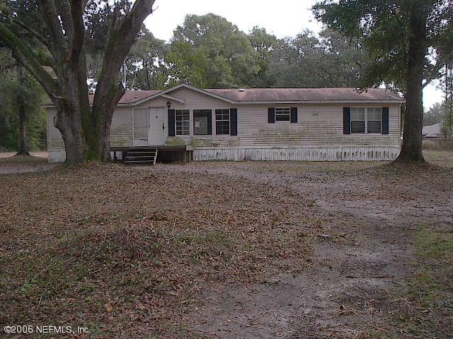 2148 Chester River Road Yulee, FL 32097 - Photo 1 of 1 a view of a house with a yard