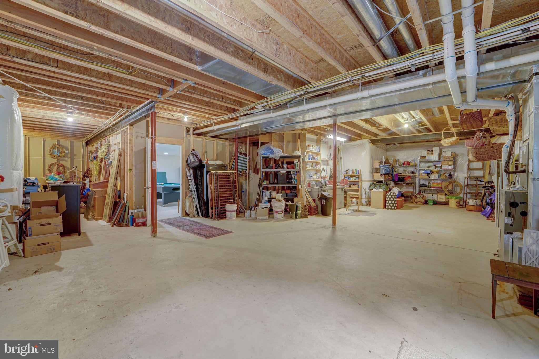 100 Evergreen Road Severna Park, MD 21146 - Photo 45 of 77 Enormous Unfinished Part of Basement has High Ceil