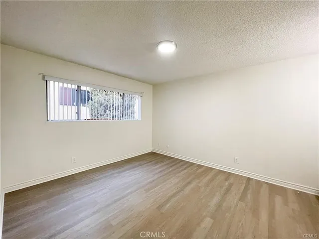 a bathroom with a toilet and a bathtub