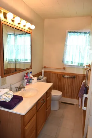 a bathroom with a tub and shower