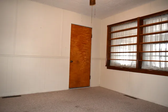 a bathroom with a tub and shower