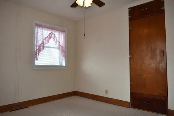 a view of a window in an empty room