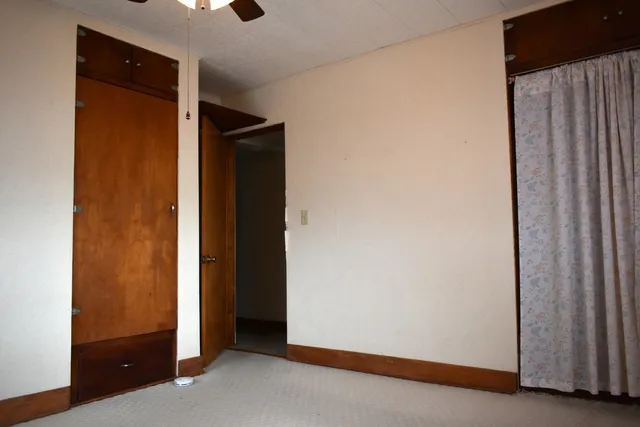 a view of a window in an empty room