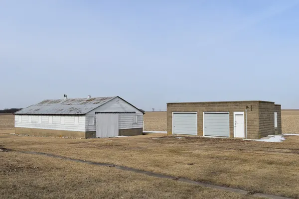 a view of a big room with closet and wooden floor