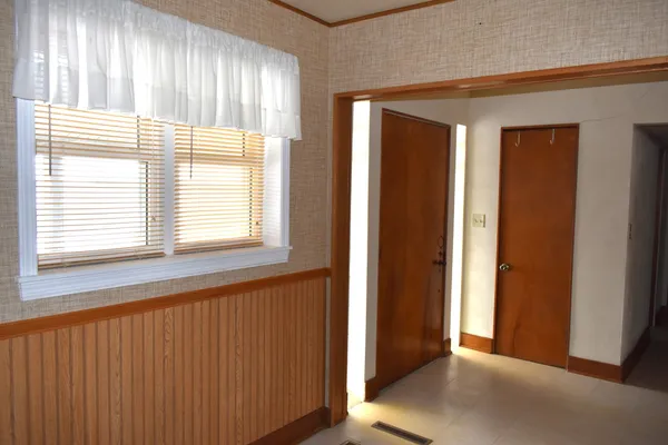 a view of a room that has a window in it