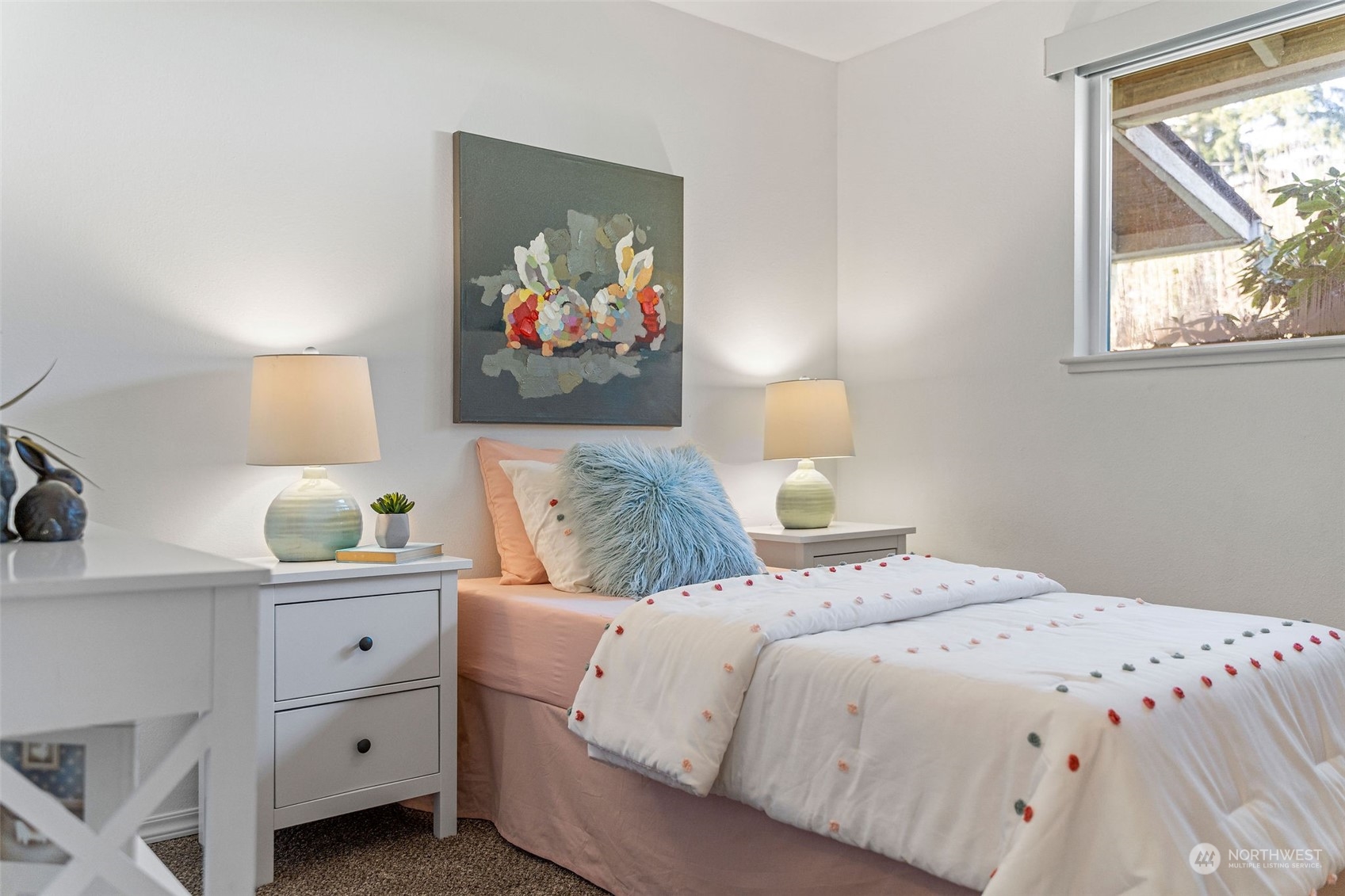 13915 99th Avenue Southeast Snohomish, WA 98296 - Photo 13 of 30 a bedroom with a bed and a painting on the wall