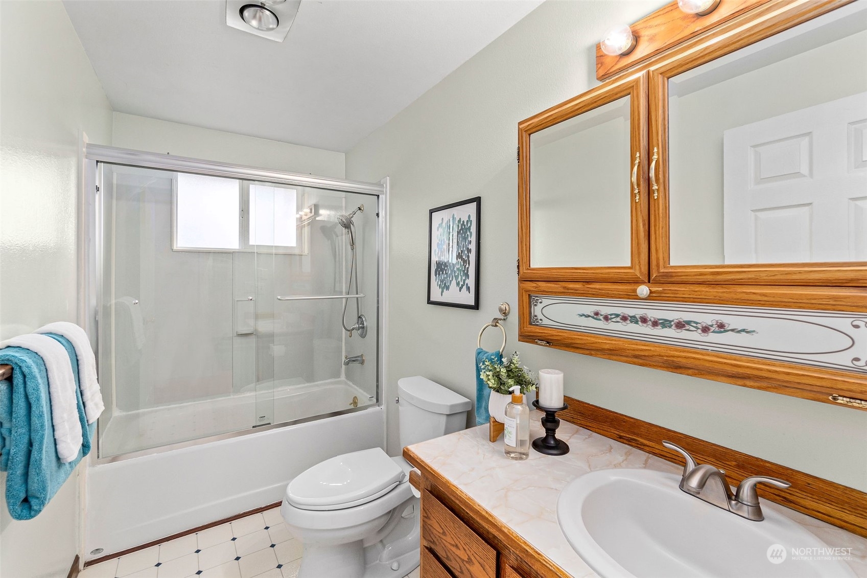 13915 99th Avenue Southeast Snohomish, WA 98296 - Photo 16 of 30 a bathroom with a granite countertop sink toilet and shower