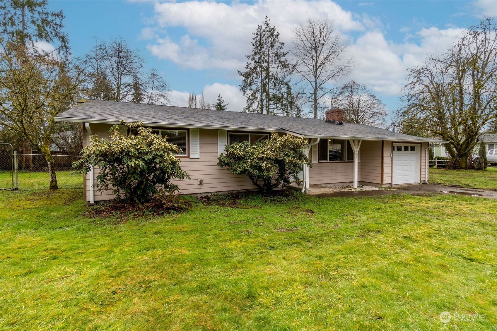 13915 99th Avenue Southeast Snohomish, WA 98296 - Photo 24 of 30 front view of a house with a garden