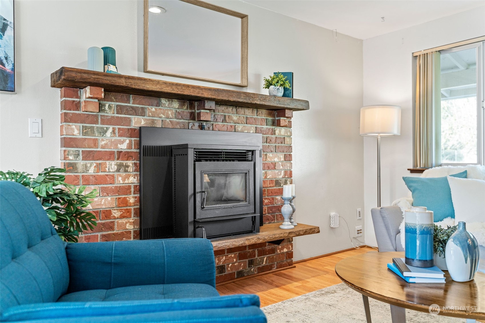 13915 99th Avenue Southeast Snohomish, WA 98296 - Photo 3 of 30 a living room with furniture and a fireplace