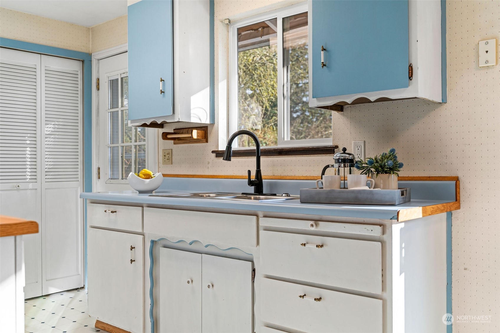 13915 99th Avenue Southeast Snohomish, WA 98296 - Photo 7 of 30 a kitchen with a sink and cabinets