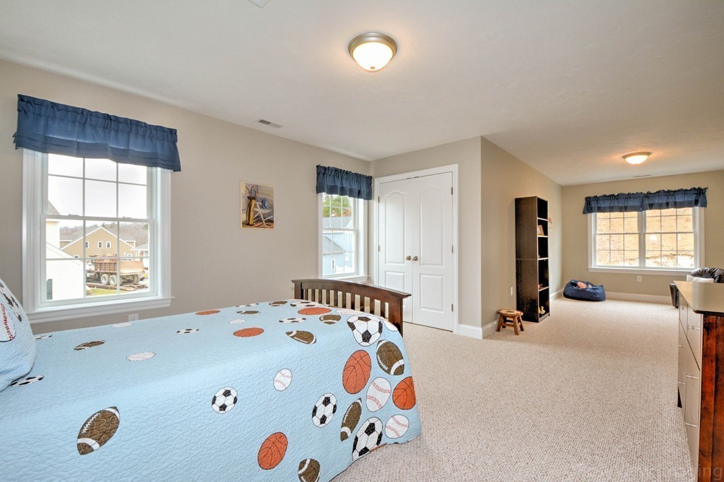 54 Partridge Hill Road Sutton, MA 01590 - Photo 16 of 20 a bedroom with a bed and a window