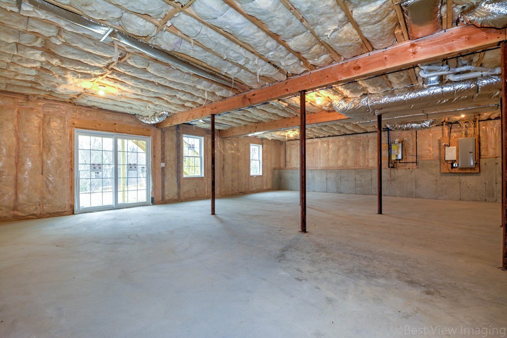 54 Partridge Hill Road Sutton, MA 01590 - Photo 18 of 20 a view of an empty room with windows