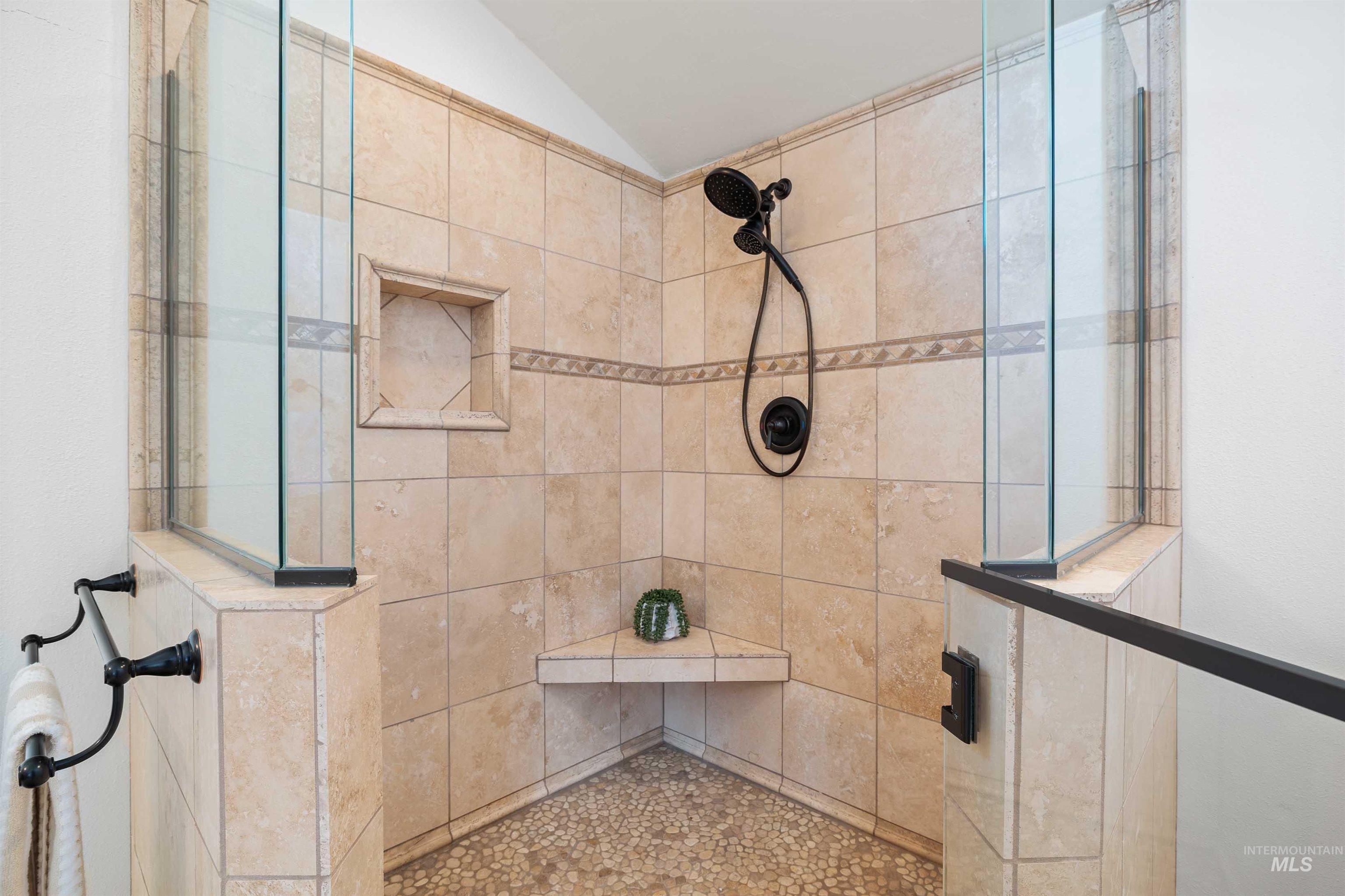 853 Pottery Road Bliss, ID 83314 - Photo 28 of 50 Full bath featuring vaulted ceiling and a tile shower