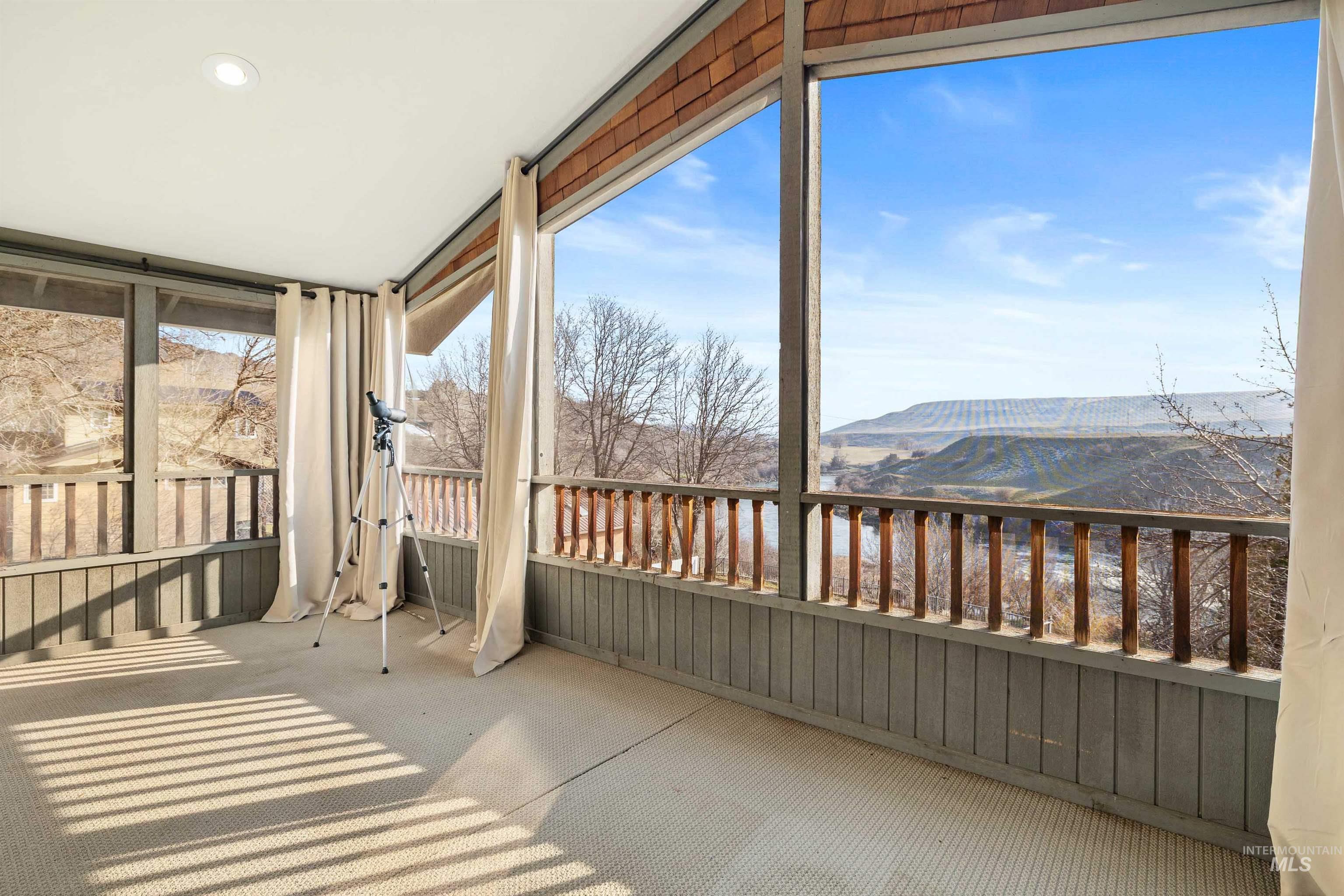 853 Pottery Road Bliss, ID 83314 - Photo 29 of 50 Unfurnished sunroom featuring a mountain view and a balcony