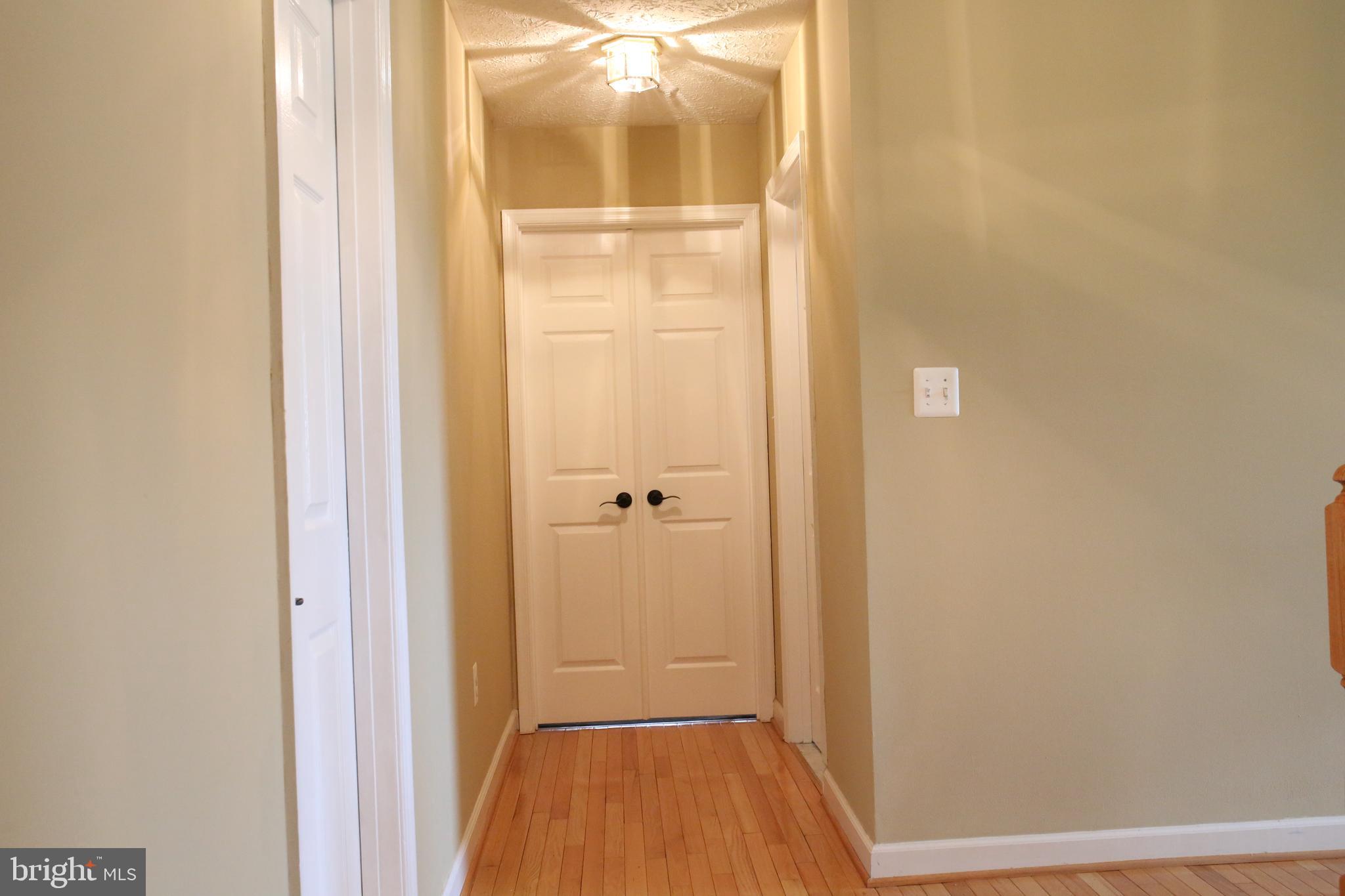 9705 Rider Court Fort Washington, MD 20744 - Photo 20 of 66 Upper Level Hallway leading to master bedroom