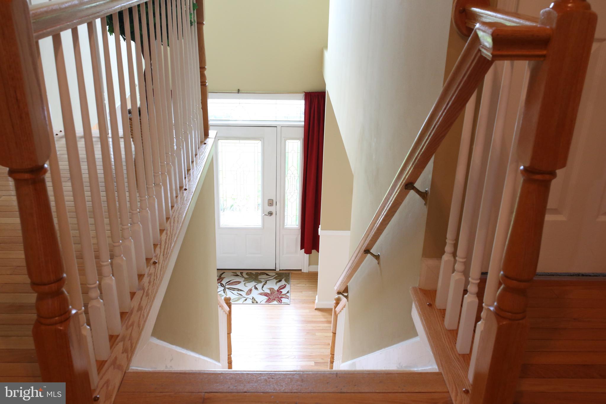 9705 Rider Court Fort Washington, MD 20744 - Photo 23 of 66 Stairs from main level leading to upper level