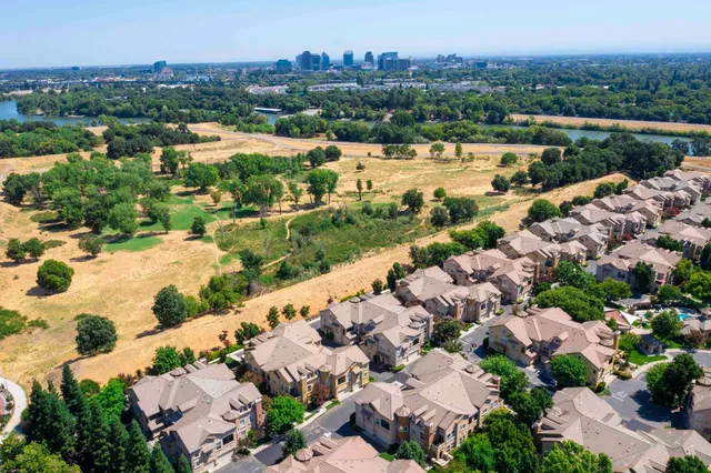 an aerial view of a city with lots of residential buildings
