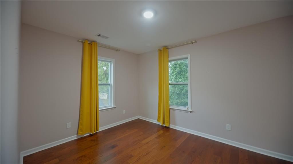 884 Coleman Street Southwest Atlanta, GA 30310 - Photo 25 of 30 a view of an empty room with a window