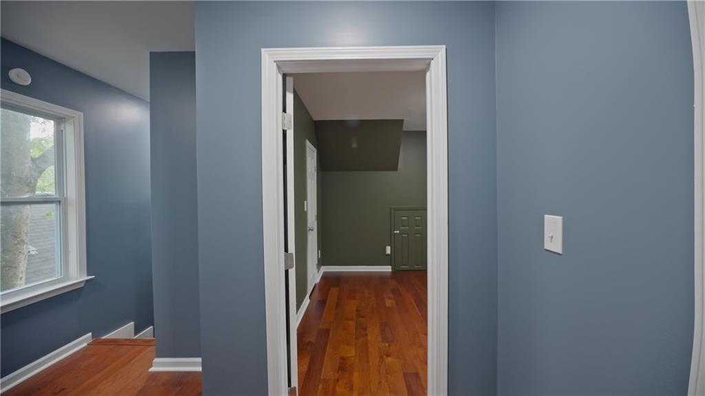 884 Coleman Street Southwest Atlanta, GA 30310 - Photo 27 of 30 a view of a bedroom from a hallway