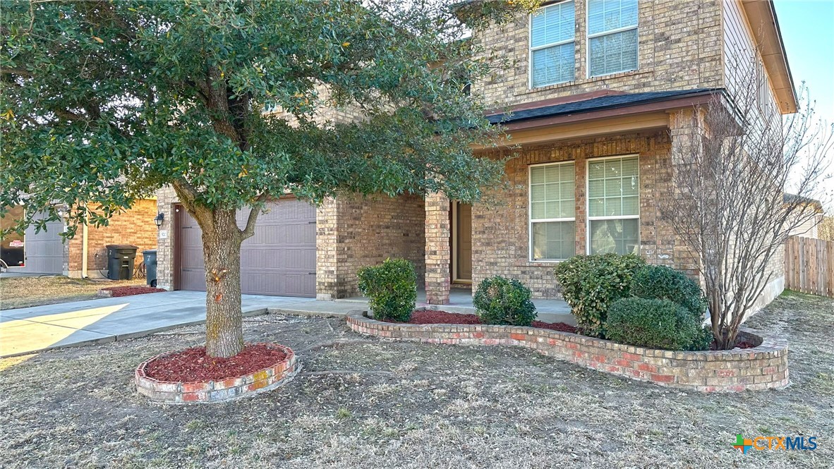 5203 Willamette Lane Killeen, TX 76549 - Photo 2 of 48 a front view of a house with a tree
