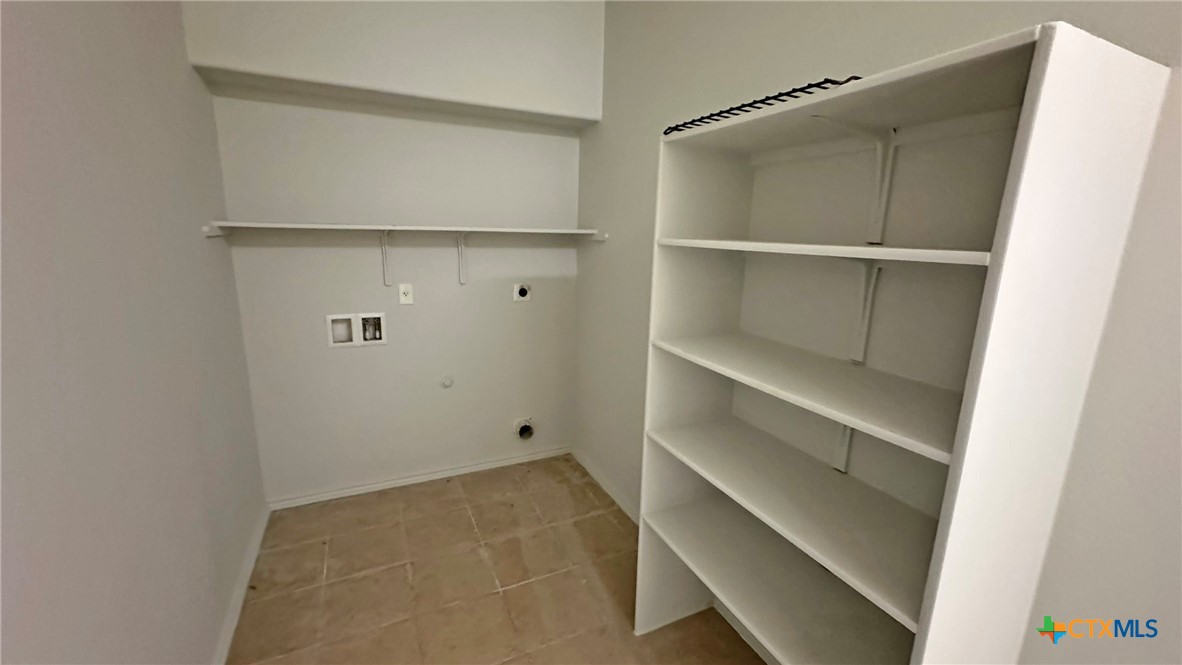 5203 Willamette Lane Killeen, TX 76549 - Photo 23 of 48 a view of an empty walk in closet