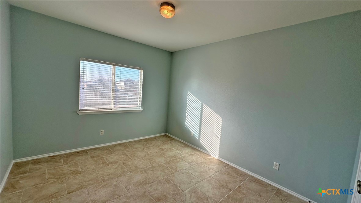 5203 Willamette Lane Killeen, TX 76549 - Photo 24 of 48 a view of an empty room with a window