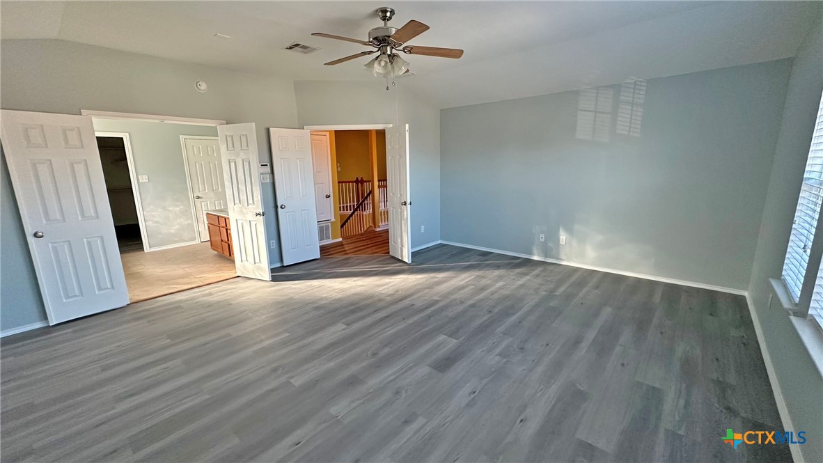 5203 Willamette Lane Killeen, TX 76549 - Photo 39 of 48 wooden floor in an empty room with a window