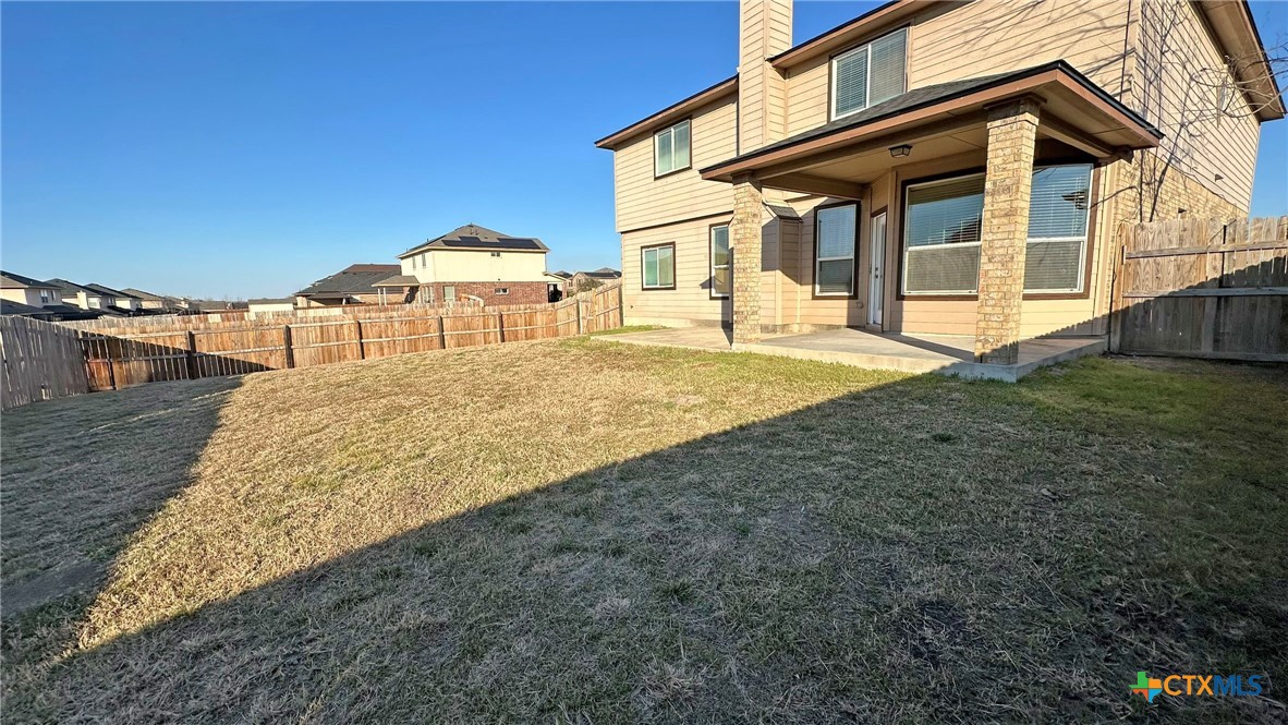 5203 Willamette Lane Killeen, TX 76549 - Photo 44 of 48 a view of a white house with a yard and table and chairs