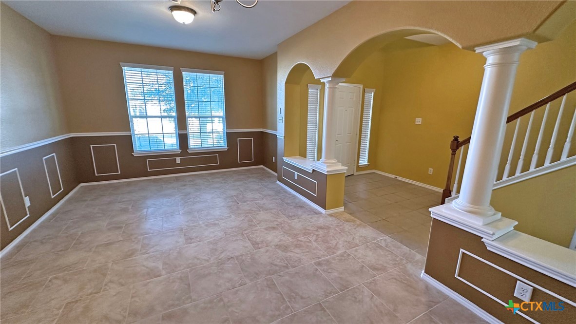 5203 Willamette Lane Killeen, TX 76549 - Photo 5 of 48 a view of an empty room with windows