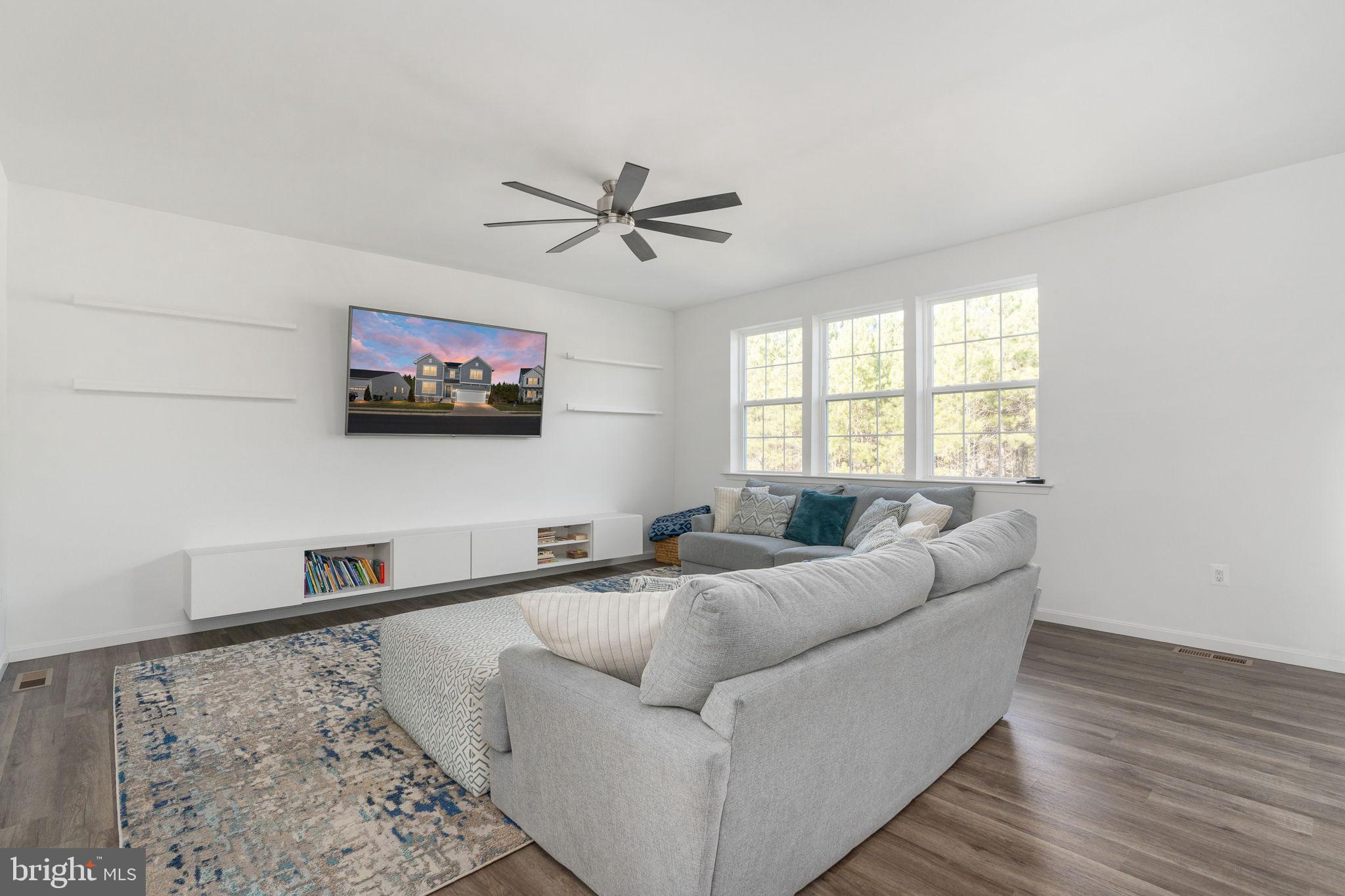 6371 Pointer Lane King George, VA 22485 - Photo 14 of 51 Bright and airy family room.