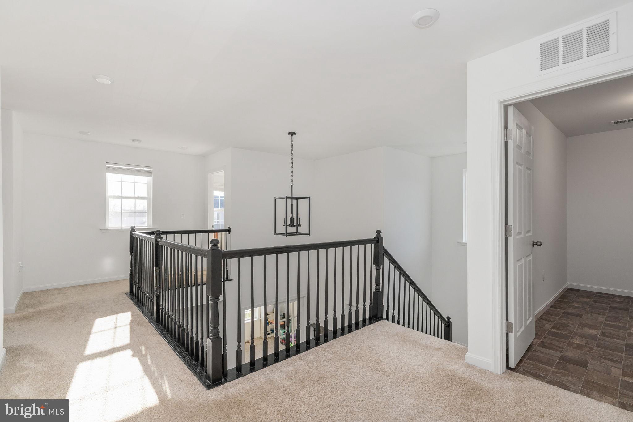 6371 Pointer Lane King George, VA 22485 - Photo 26 of 51 Bright and airy second-floor landing.
